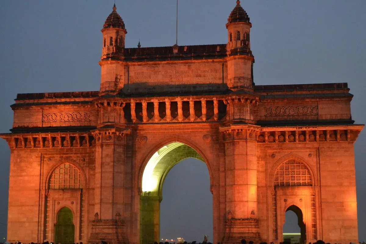 The Gateway of India lit at dusk in Mumbai, India